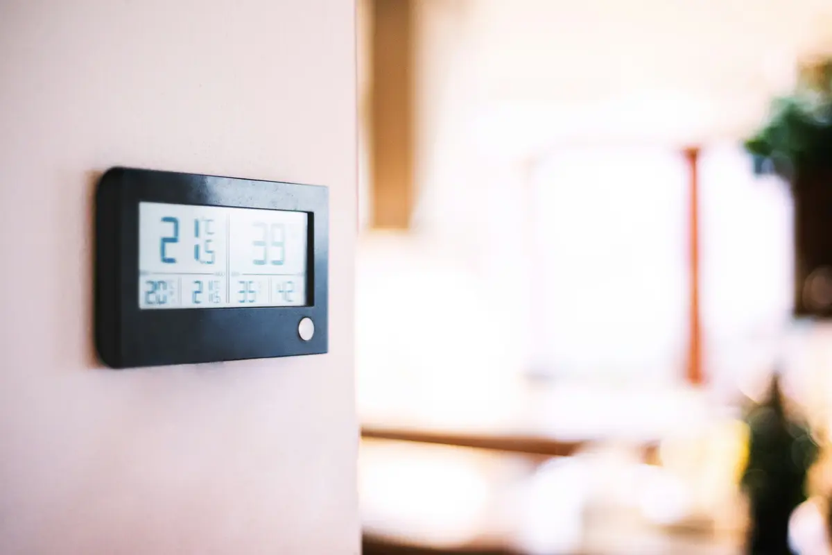 Modern smart thermostat on a residential wall in Las Vegas